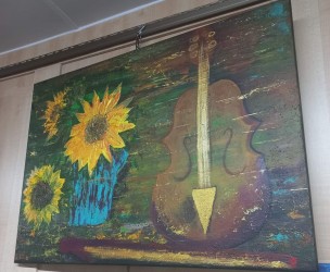 Floarea soarelui si o vioara